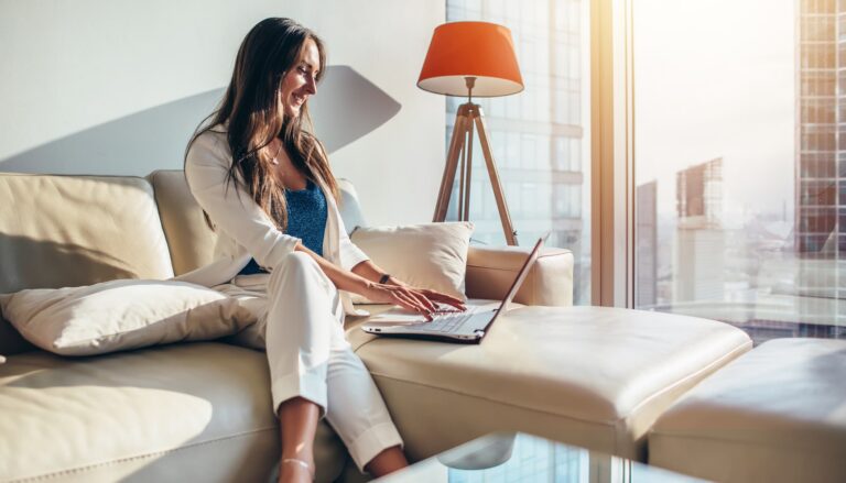 A woman browsing on her laptop